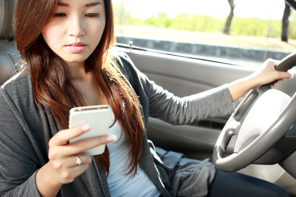 Teenager texting and driving