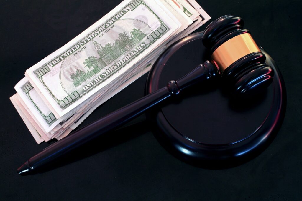 Photo of Gavel and Cash | Fort Worth Personal Injury Lawyer | Berenson Injury Law