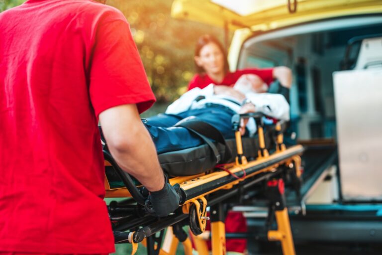Medical Team Assisting a Seriously Injured Person | Serious Injuries Attorney | Berenson Injury Law