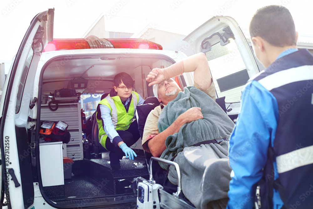 Guy taken by the ambulance | Car Accident Attorney | Berenson Injury Law